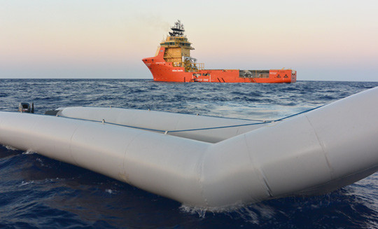 100&thinsp;&ndash;&thinsp;200 migrants were rescued from this vessel by MS Siem Pilot (in the background). Both photos: Kripos/the Royal&hellip;