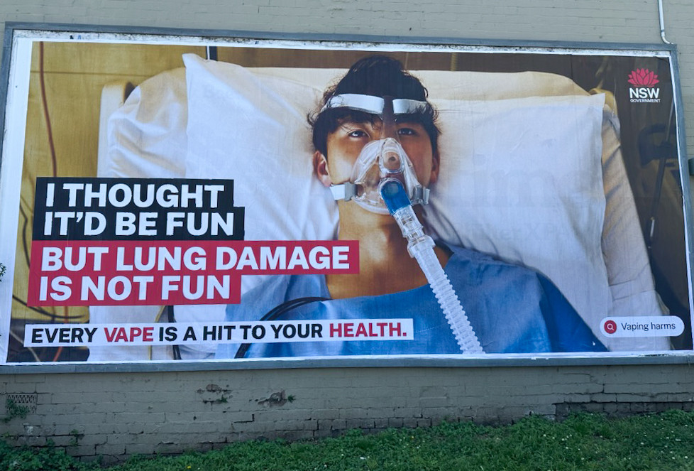 Figure 1 Billboard with health information in Sydney, Australia, December 2024. Photo: Yngvar Nilssen.